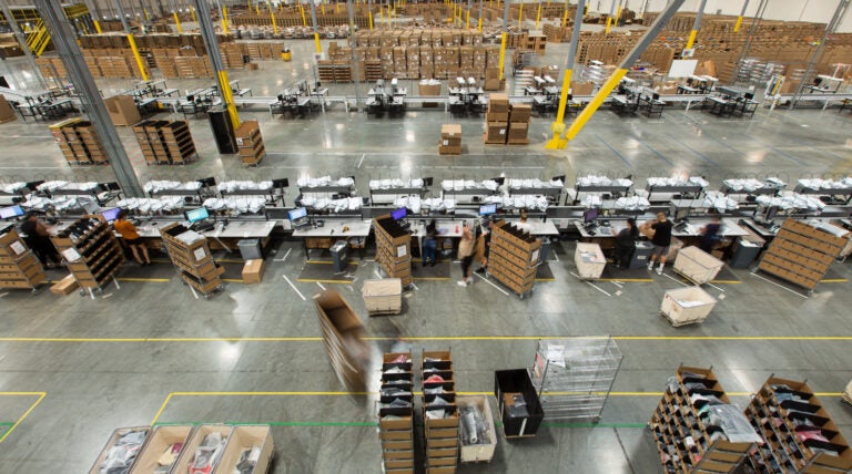 Comparing Manual and Automated Warehousing Operations-Feature