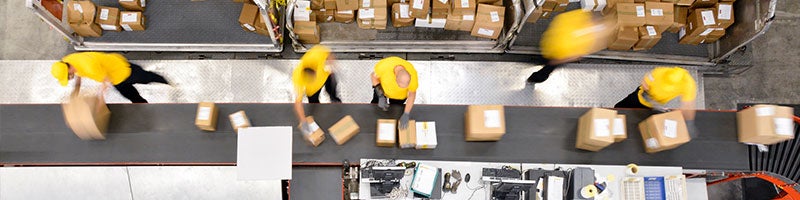 Workers on an assembly line