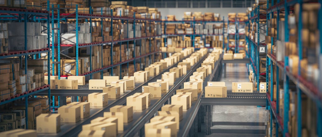Boxes moving on a conveyor in a warehouse